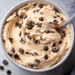 Cottage cheese cookie dough in a glass bowl with chocolate chips – high-protein, no-bake dessert