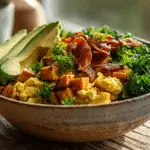 Whole30 Breakfast Power Bowl with eggs, sweet potato, and avocado.