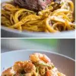 A bowl of creamy Cajun surf and turf pasta with seared steak strips and juicy shrimp, garnished with fresh parsley, on a wooden table.
