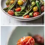 Crispy golden sautéed okra pods with charred edges, cherry tomatoes, caramelized onions, and flaky sea salt in a cast iron skillet.