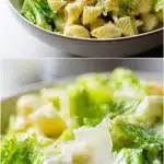 Overhead shot of a white bowl filled with creamy caesar pasta salad recipe, featuring glossy cavatappi noodles, fresh chopped romaine lettuce, and large shaved parmesan cheese flakes on a light wood table.
