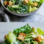 A vibrant, crisp Caesar salad in a large wooden bowl featuring fresh romaine lettuce leaves, golden-brown sourdough croutons, shaved parmesan cheese, and a creamy dressing, photographed on a rustic table with scattered pepper and a linen napkin.