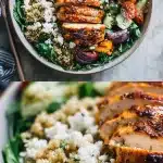 Overhead view of a vibrant high protein quinoa salad bowl featuring sliced grilled chicken breast, fluffy quinoa, chickpeas, halved cherry tomatoes, diced cucumber, red onion, and avocado slices on a light marble surface with a fork to the side.