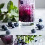 A tall glass of zero-sugar blueberry mojito filled with sparkling crushed ice, deep purple muddled wild blueberries, and fresh green mint sprigs, set on a light wooden table with scattered berries and a lime wedge in natural sunlight.